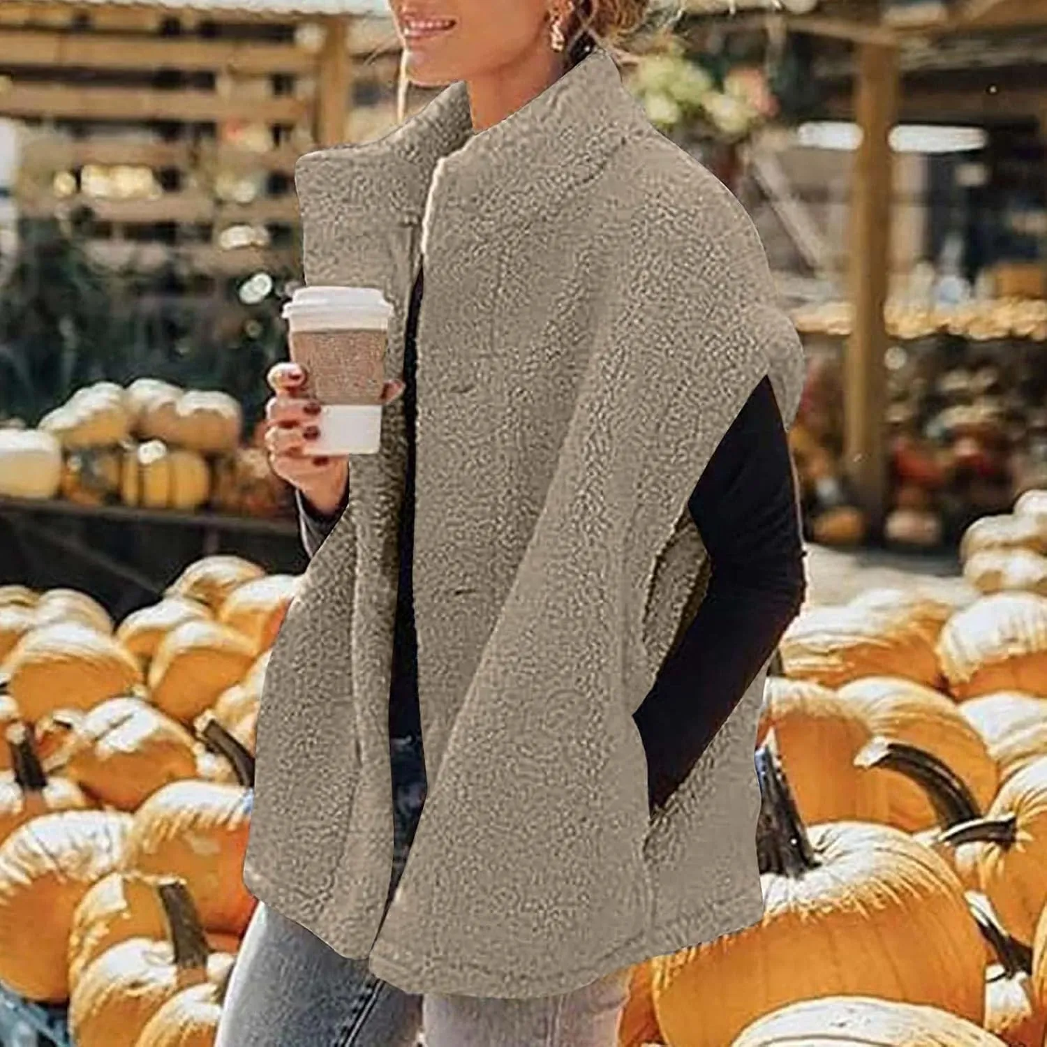 YRAETENM Women's Fuzzy Fleece Vest Casual Oversized Warm Button down Gilet Soft Sleeveless Stand Collar Jackets with Pockets